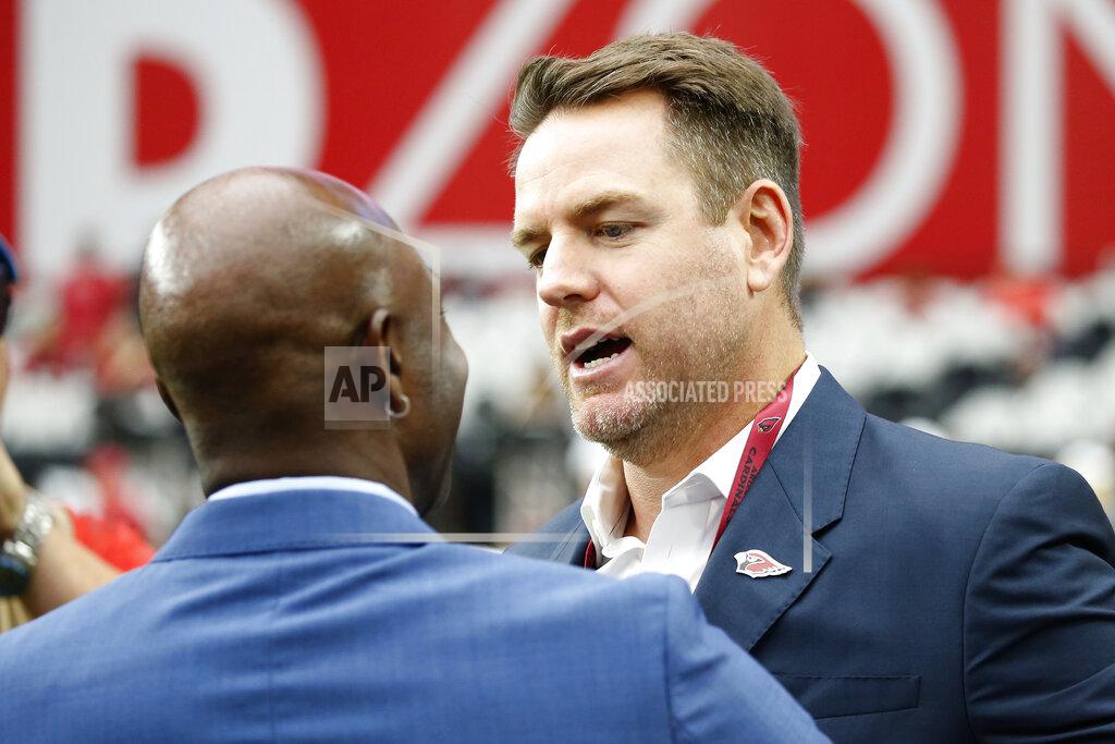 Ross D. Franklin Former Arizona Cardinals quarterback Carson Palmer greets NFL Hall of Famer Jerry Rice prior to an NFL football game between the Seattle Seahawks and the Arizona Cardinals, Sunday, Sept. 29, 2019, in Glendale, Ariz. (AP Photo/Ross D. Franklin)