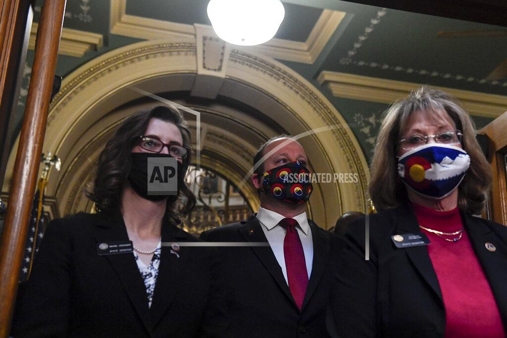 Aaron Ontiveroz Gov. Jared Polis arrives to deliver his state of the state in front of the House of Representatives at the Colorado State Capitol Building in Denver on Wednesday, Feb. 17, 2021. (AAron Ontiveroz/The Denver Post via AP, Pool)