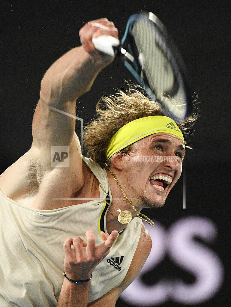 Andy Brownbill Germany's Alexander Zverev serves to Serbia's Novak Djokovic during their quarterfinal match at the Australian Open tennis championship in Melbourne, Australia, Tuesday, Feb. 16, 2021.(AP Photo/Andy Brownbill)