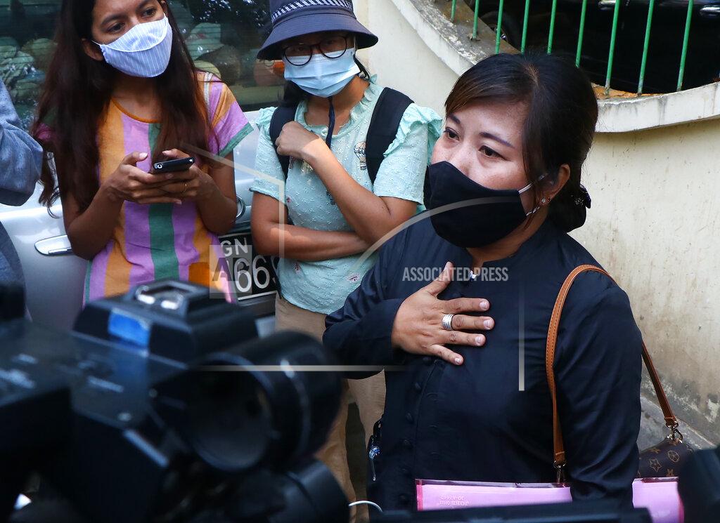 Uncredited Tin Zar Oo, a lawyer representing the Associated Press journalist Thein Zaw, speaks to reporters outside the Kamayut court in Yangon, Myanmar Friday, Mar. 12, 2021. The court is scheduled to hold a hearing on Friday for Thein Zaw who was detained while covering demonstrations against the military's seizure of power last month. He is facing a charge that could send him to prison for three years. (AP Photo)
