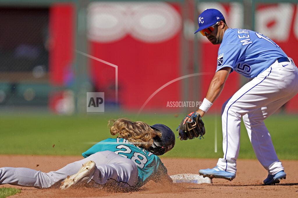 Charlie Riedel Seattle Mariners' Jake Fraley (28) is forced out at second by Kansas City Royals second baseman Whit Merrifield (15) to get the second out of a double play hit into by Jake Bauers during the fifth inning of a baseball game Sunday, Sept. 19, 2021, in Kansas City, Mo. (AP Photo/Charlie Riedel)