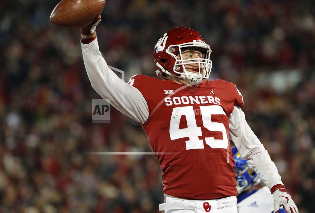 Alonzo Adams Oklahoma fullback Carson Meier (45) celebrates after a touchdown against Kansas during the first half of an NCAA college football game in Norman, Okla., Saturday, Nov. 17, 2018. (AP Photo/Alonzo Adams)