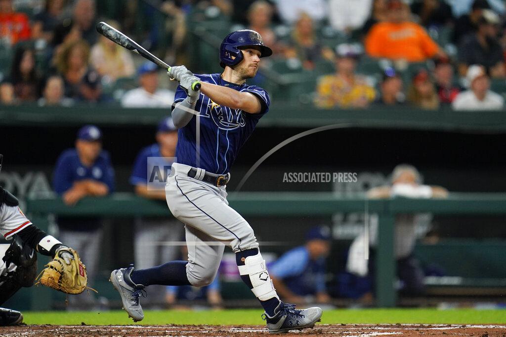 Julio Cortez Tampa Bay Rays' Brandon Lowe watches his single against the Baltimore Orioles during the third inning of a baseball game, Tuesday, July 26, 2022, in Baltimore. (AP Photo/Julio Cortez)