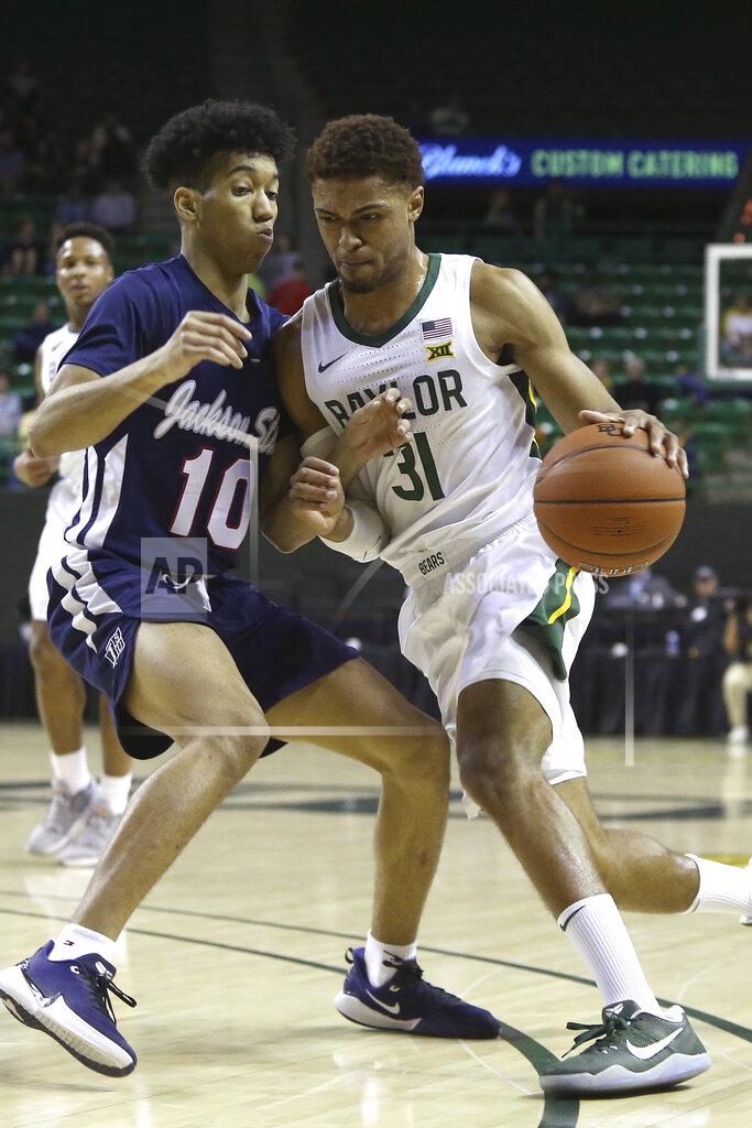 Jerry Larson Baylor guard MaCio Teague (31) drives against Jackson State guard Cainan McClelland (10) in the first half of an NCAA college basketball game, Monday, Dec. 30, 2019, in Waco, Texas. (AP Photo/Jerry Larson)