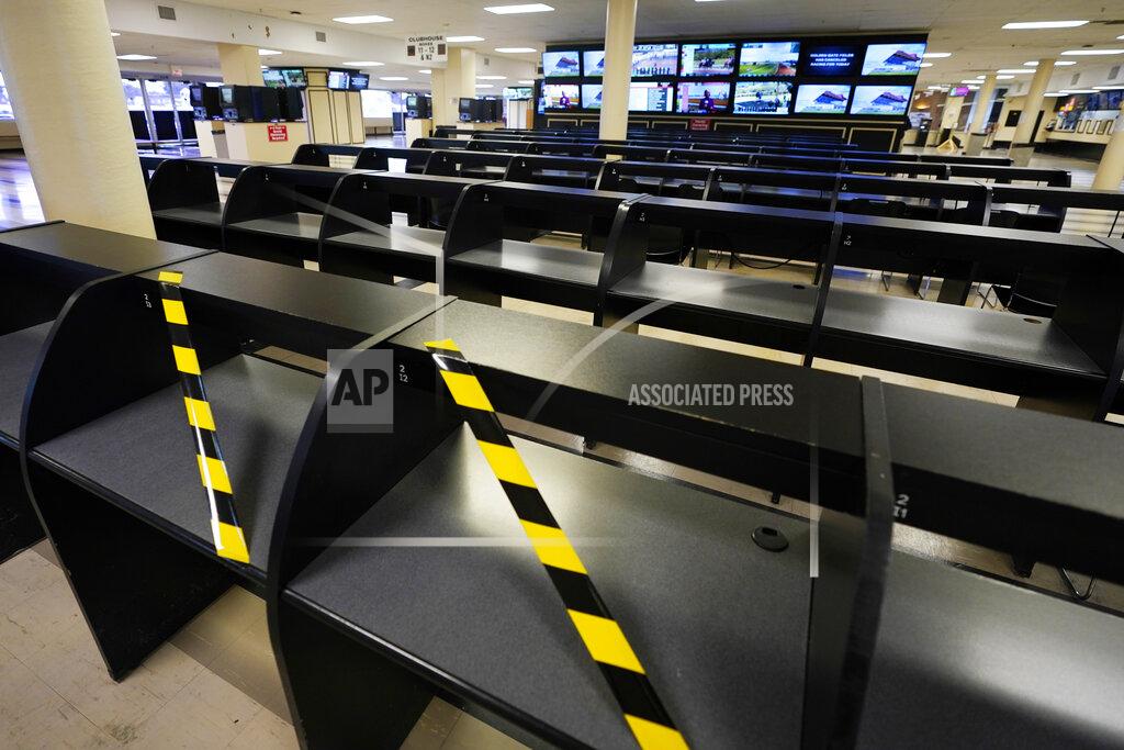 Steve Helber Betting tables are empty at Pimlico race track, Friday, Oct. 2, 2020, in Baltimore, Md., ahead Saturday's Black-Eyed Susan and Preakness Stakes races. (AP Photo/Steve Helber)