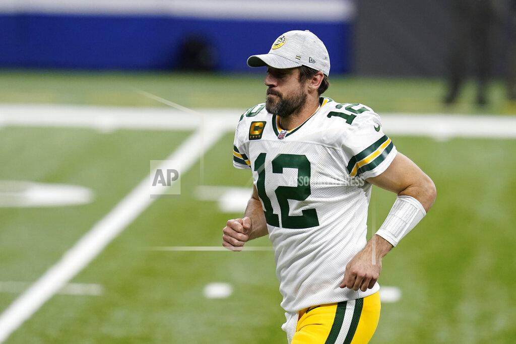 Michael Conroy Green Bay Packers quarterback Aaron Rodgers runs off the field follow an NFL football game against the Indianapolis Colts, Sunday, Nov. 22, 2020, in Indianapolis. Indianapolis won in overtime. (AP Photo/Michael Conroy)