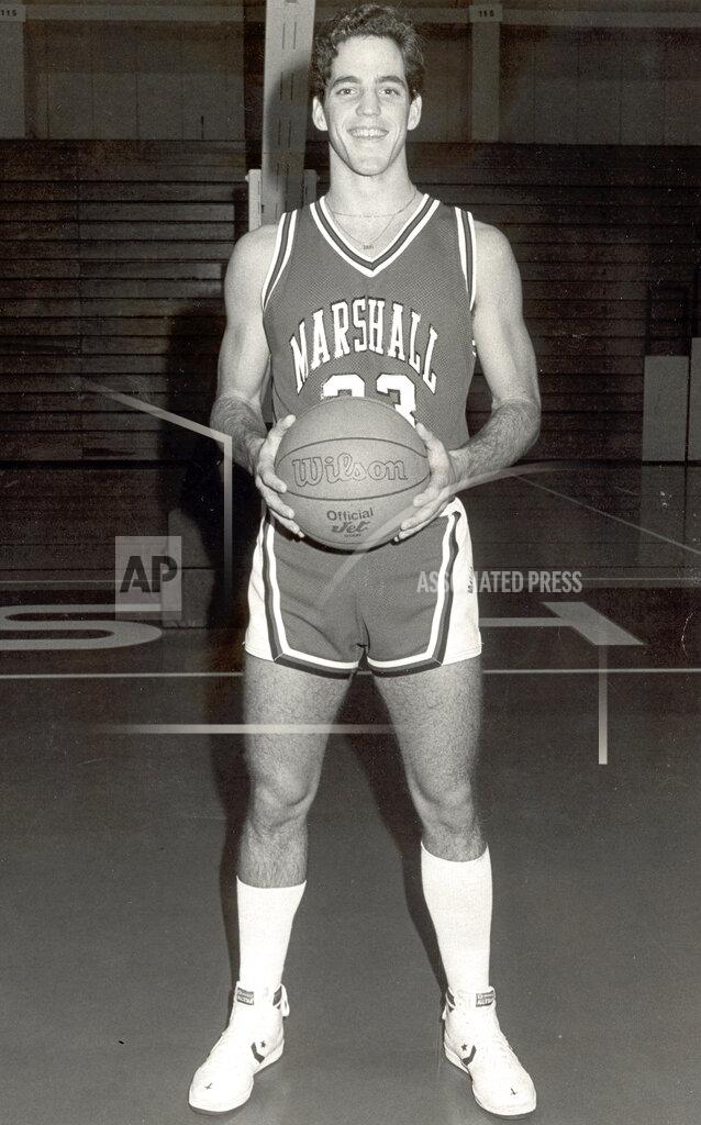 Uncredited This undated image provided by Marshall University shows Bruce Morris. Thirty-four years after hitting the longest shot in NCAA college basketball history, Bruce Morris is still amazed at what he accomplished. Morris was Marshall's point guard when he hit the historic basket from 89 feet, 10 inches just before halftime against Appalachian State on Feb. 7, 1985. (Marshall University via AP)