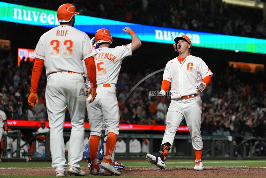 Tony Avelar San Francisco Giants' Joc Pederson, right, celebrates with Mike Yastrzemski (5) and Darin Ruf (33) after hitting a three-run home run against the New York Mets during the eighth inning of a baseball game in San Francisco, Tuesday, May 24, 2022. (AP Photo/Tony Avelar)