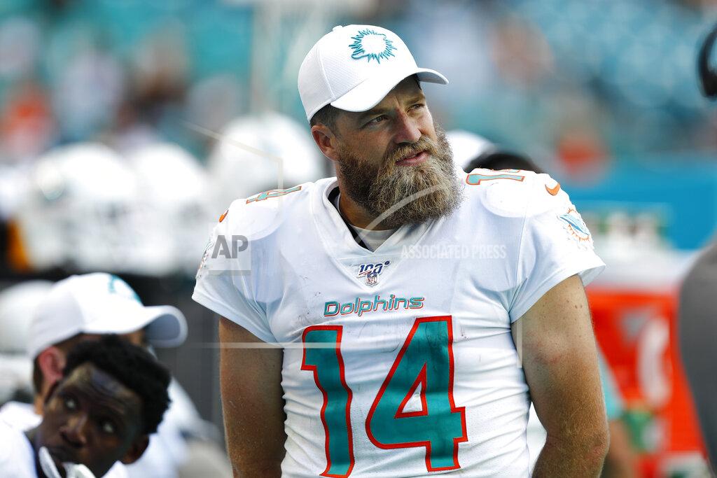 Brynn Anderson Miami Dolphins quarterback Ryan Fitzpatrick (14) walks the sidelines at the end of the second half at an NFL football game, Sunday, Sept. 8, 2019, in Miami Gardens, Fla. The Ravens defeated the Dolphins 59-10. (AP Photo/Brynn Anderson)