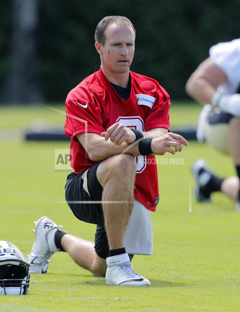Gerald Herbert New Orleans Saints quarterback Drew Brees warms up during an NFL football practice in Metairie, La., Thursday, May 23, 2019. (AP Photo/Gerald Herbert)