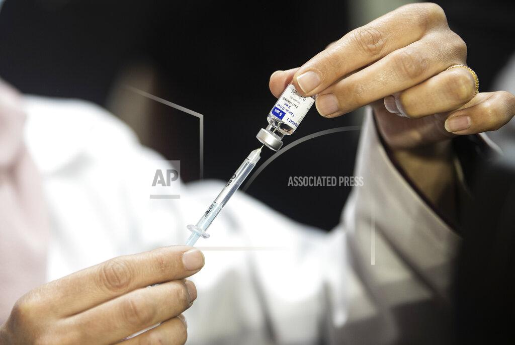 Khalil Hamra A Palestinian medic prepares a shot of the Russian-made Sputnik V coronavirus vaccine, in Gaza City, Monday, Feb. 22, 2021. (AP Photo/Khalil Hamra)
