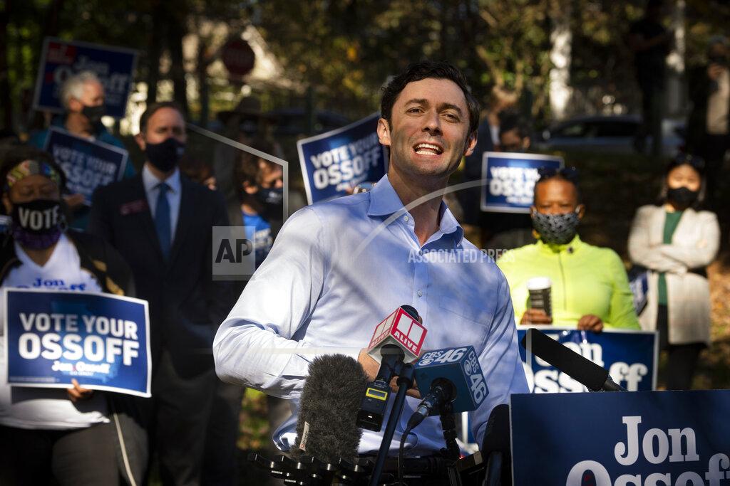 John Amis Georgia Democratic candidate for U.S. Senate Jon Ossoff speaks to the media as he rallies supporters for a run-off against Republican candidate Sen. David Perdue, as they meet in Grant Park, Friday, Nov. 6, 2020, in Atlanta. (AP Photo/John Amis)