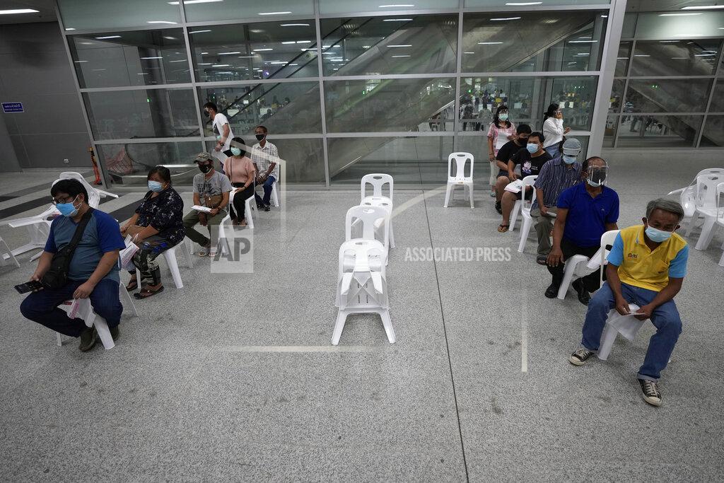 Sakchai Lalit Residents wait for a dose of the AstraZeneca COVID-19 vaccine at the Central Vaccination Center in Bangkok, Thailand, Thursday, July 22, 2021. (AP Photo/Sakchai Lalit)