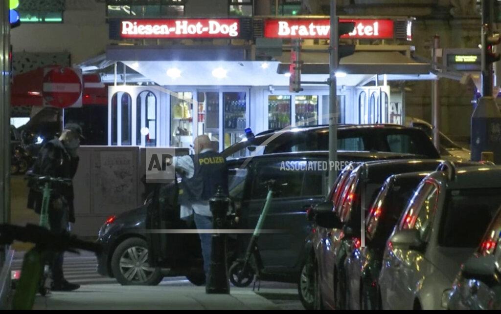 Uncredited In this image made from video, police at the scene after gunshots were heard, in Vienna, Monday, Nov. 2, 2020. Austrian police say several people have been injured and officers are out in force following gunfire in the capital Vienna. Initial reports that a synagogue was the target of an attack couldn’t immediately be confirmed. Austrian news agency APA quoted the country’s Interior Ministry saying one attacker has been killed and another could be on the run. (AP Photo)