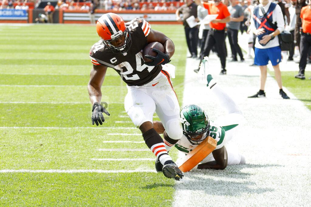 Ron Schwane Cleveland Browns running back Nick Chubb (24) runs away from New York Jets linebacker Quincy Williams (56) for a touchdown during the first half of an NFL football game, Sunday, Sept. 18, 2022, in Cleveland. (AP Photo/Ron Schwane)