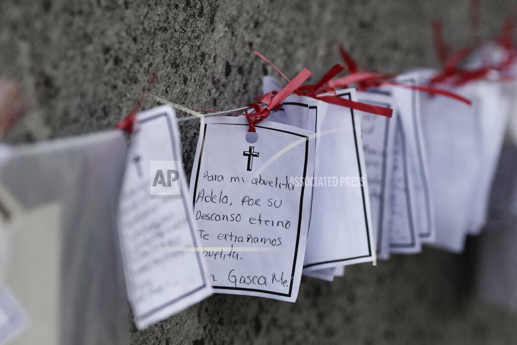 Eduardo Verdugo Messages written by loved ones and dedicated to the deceased hang from a wall at a memorial for COVID-19 victims installed outside the Basilica of Guadalupe in Mexico City, Wednesday, April 14, 2021. (AP Photo/Eduardo Verdugo)