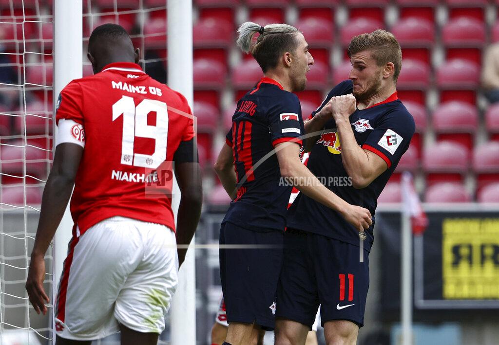 Kai Pfaffenbach Leipzig's Timo Werner celebrates scoring their fourth goal with Kevin Kampl during a German Bundesliga soccer match between FSV Mainz 05 and RB Leipzig in Mainz, Germany, Sunday, May 24, 2020. (Kai Pfaffenbach/pool via AP)