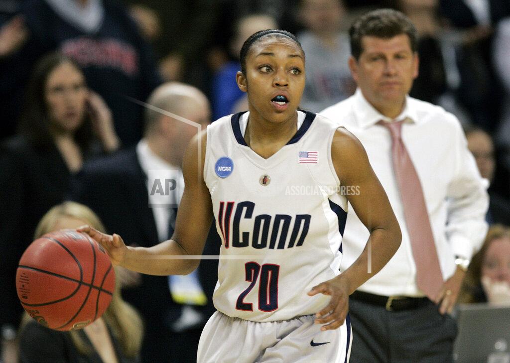 Mel Evans FILE - In this March 31, 2009, file photo, Connecticut guard Renee Montgomery brings the ball up during the second half of a women's NCAA college basketball tournament regional final against Arizona State in Trenton, N.J. At rear is Connecticut coach Gene Auriemma. Montgomery and Tiffany Hayes appreciated what former UConn teammate Maya Moore was doing when the All-Star forward stepped away from basketball two years ago to focus on criminal justice reform. The Atlanta Dream guards admit they weren't sure why she couldn't continue keep playing at the same time. Now they have a better understanding. (AP Photo/Mel Evans, File)