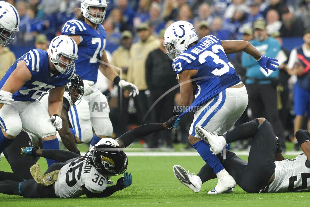 Aj Mast Indianapolis Colts running back Jonathan Williams (33) runs out of a tackle by Jacksonville Jaguars' Ronnie Harrison (36) during the first half of an NFL football game, Sunday, Nov. 17, 2019, in Indianapolis. (AP Photo/AJ Mast)