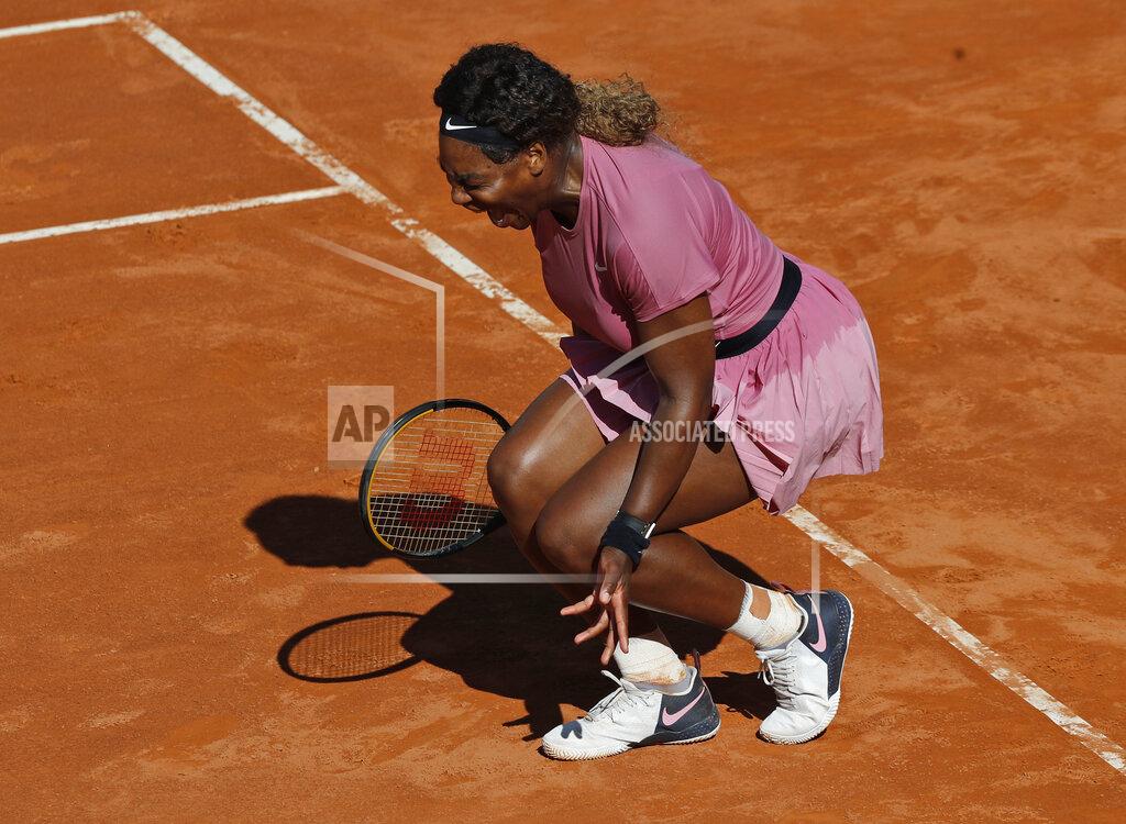 Serena Williams of the United States shouts during her match against Nadia Podoroska of Argentina at the Italian Open tennis tournament, in Rome, Wednesday, May 12, 2021. Podoroska beat Williams 7-6, 7-5. (AP Photo/Alessandra Tarantino)