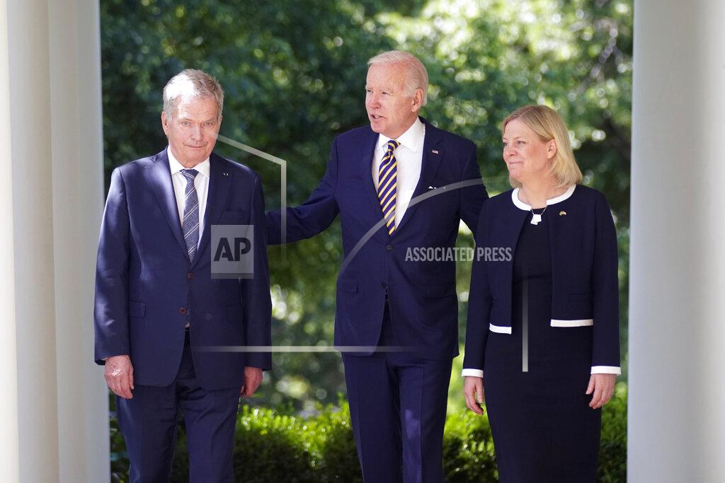 Andrew Harnik President Joe Biden accompanied by Swedish Prime Minister Magdalena Andersson and Finnish President Sauli Niinisto, walks out to speak in the Rose Garden of the White House in Washington, Thursday, May 19, 2022. (AP Photo/Andrew Harnik)
