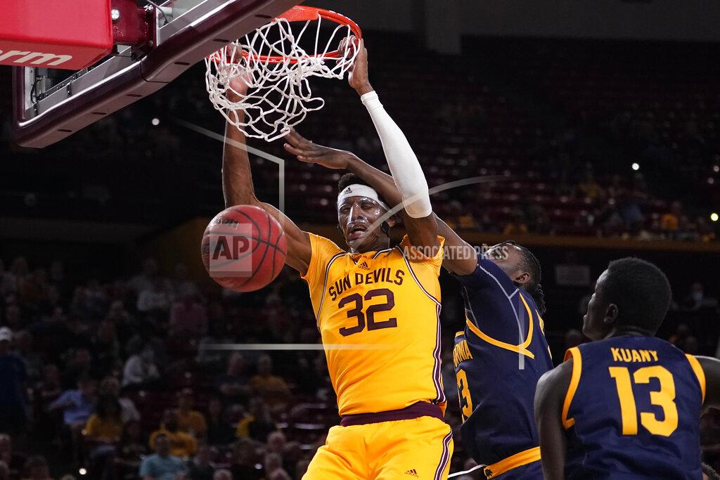 Matt York Arizona State forward Alonzo Gaffney (32) dunks as California forward Obinna Anyanwu (23) defends during the second half of an NCAA college basketball game, Thursday, March 3, 2022, in Tempe, Ariz. (AP Photo/Matt York)