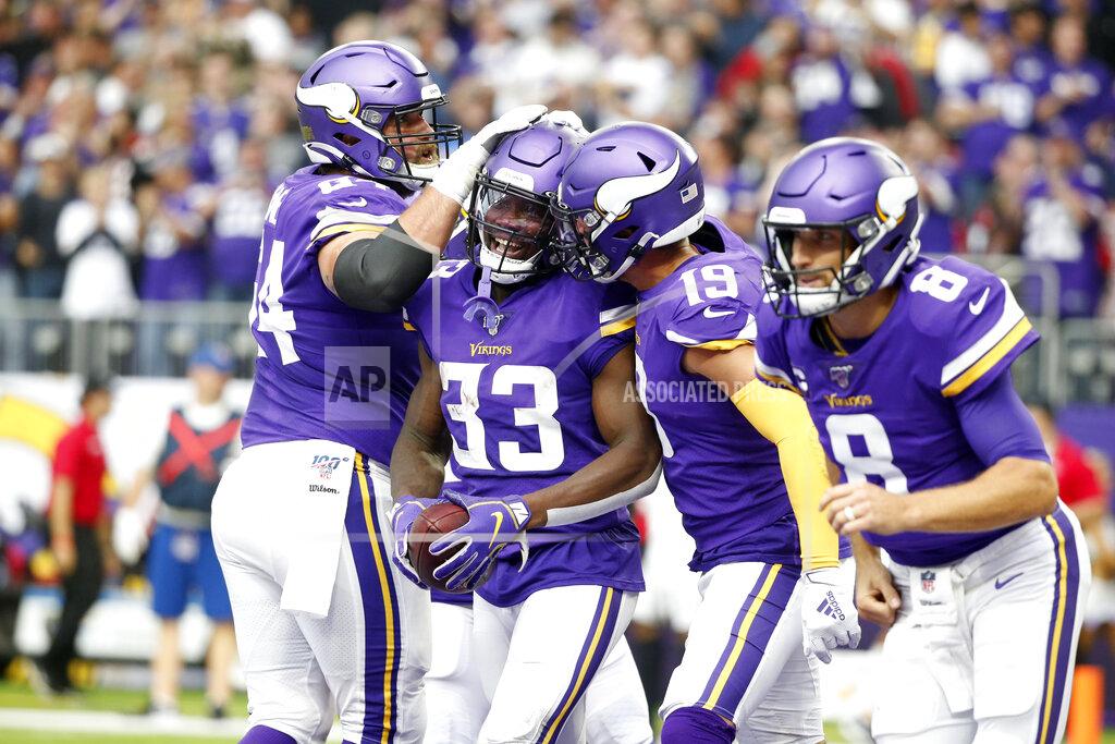 Bruce Kluckhohn Minnesota Vikings running back Dalvin Cook (33) celebrates with teammates after a 19-yard touchdown run during the first half of an NFL football game against the Atlanta Falcons, Sunday, Sept. 8, 2019, in Minneapolis. (AP Photo/Bruce Kluckhohn)