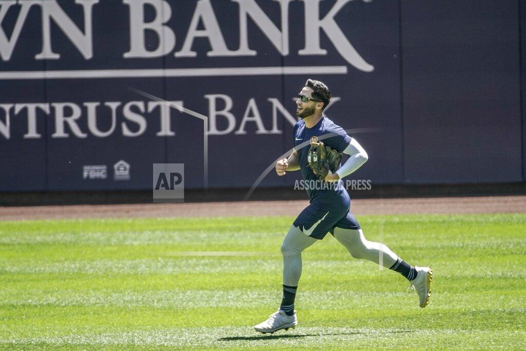 Morry Gash Milwaukee Brewers' Ryan Braun runs during a practice session Saturday, July 4, 2020, at Miller Park in Milwaukee. (AP Photo/Morry Gash)
