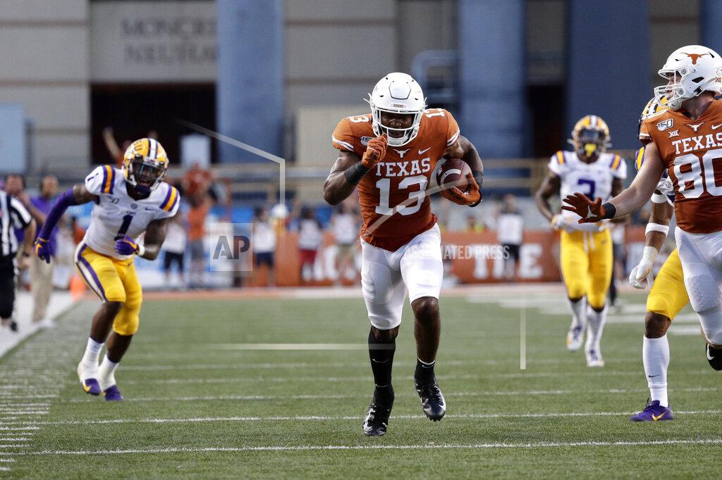 Eric Gay Texas wide receiver Brennan Eagles (13) runs with a touchdown reception in front of LSU cornerback Kristian Fulton, left, during the first half of an NCAA college football game Saturday, Sept. 7, 2019, in Austin, Texas. (AP Photo/Eric Gay)