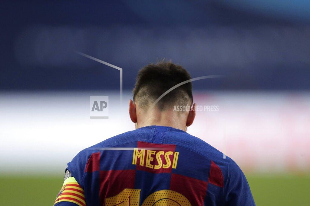Manu Fernandez Barcelona's Lionel Messi during the Champions League quarterfinal match between FC Barcelona and Bayern Munich at the Luz stadium in Lisbon, Portugal, Friday, Aug. 14, 2020. Gerard Piqué says Barcelona "hit rock bottom" in an 8-2 humiliation from Bayern Munich in the Champions League quarterfinals. It's 74 years since Barcelona conceded eight goals in a game. (AP Photo/Manu Fernandez/Pool)