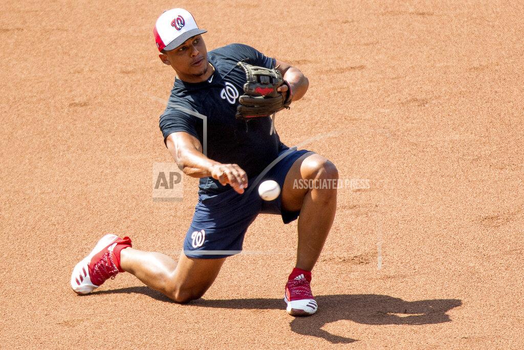 Andrew Harnik Washington Nationals' Wilmer Difo (1) as the Washington Nationals hold their first training camp work out at Nationals Stadium, Friday, July 3, 2020, in Washington. (AP Photo/Andrew Harnik)