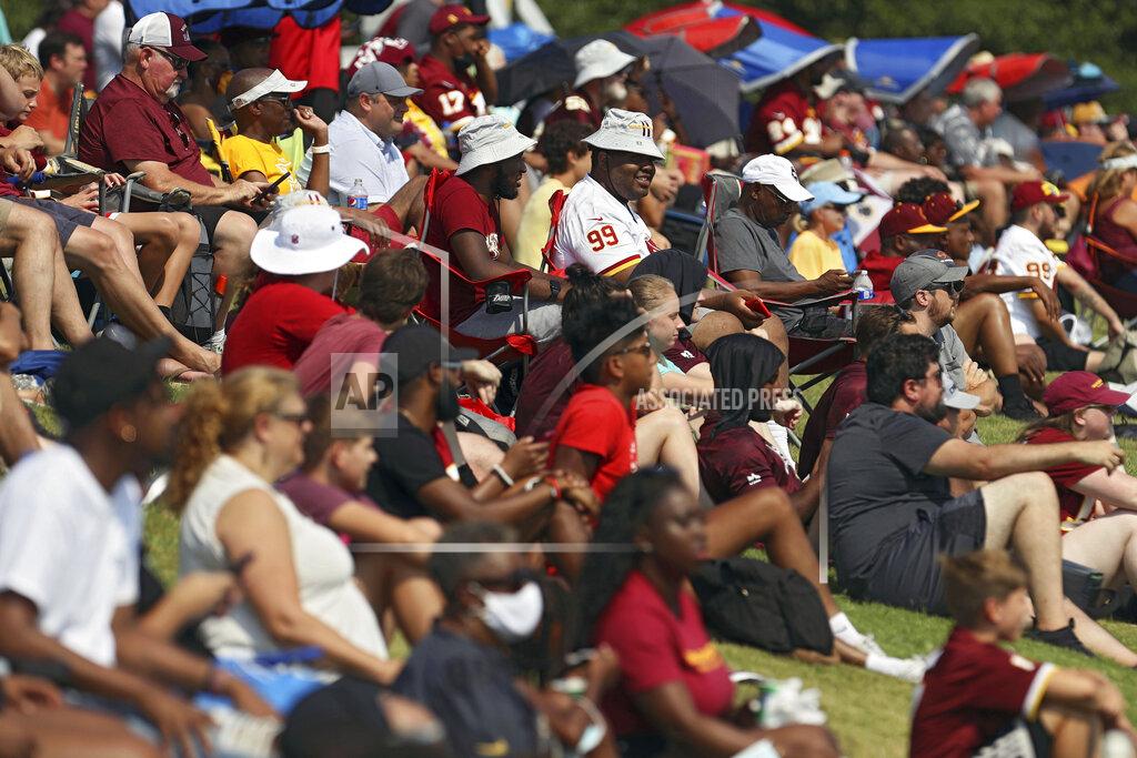 Ryan M. Kelly Washington Football Team fans watch drills during NFL football practice in Richmond, Va., Wednesday, July 28, 2021. (AP Photo/Ryan M. Kelly)