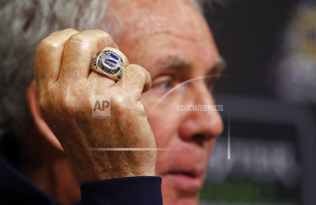 Wade Payne The ring on Hall of Fame driver and FOX television announcer Darrell Waltrip is seen as he speaks to the media during a press conference announcing his retirement from the booth before practice for a NASCAR Cup Series auto race, Friday, April 5, 2019, in Bristol, Tenn. (AP Photo/Wade Payne)