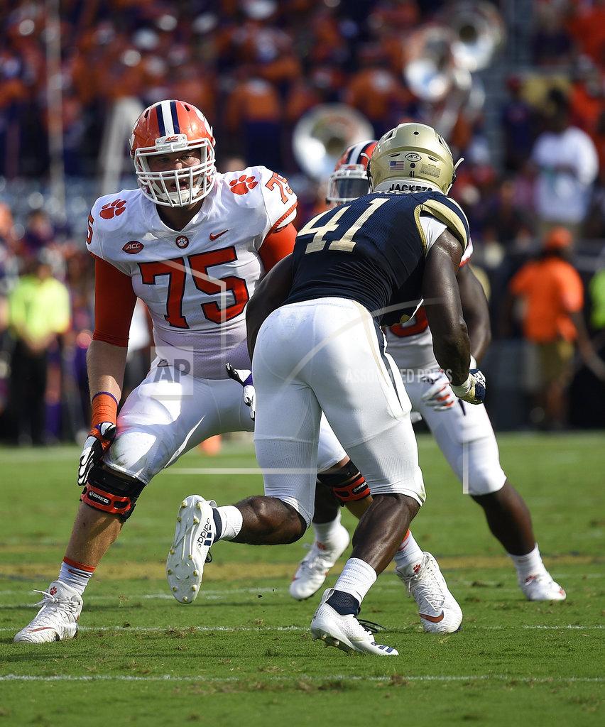 Jon Barash FILE - In this Sept. 22, 2018, file photo, Clemson offensive tackle Mitch Hyatt (75) works against Georgia Tech during the first half of an NCAA college football game, in Atlanta. No. 2 Clemson once again dominated the Associated Press All-Atlantic Coast Conference teams and individual awards released Tuesday, Dec. 4, 2018. Mitch Hyatt was a unanimous pick for the second straight year. (AP Photo/Jon Barash, File)