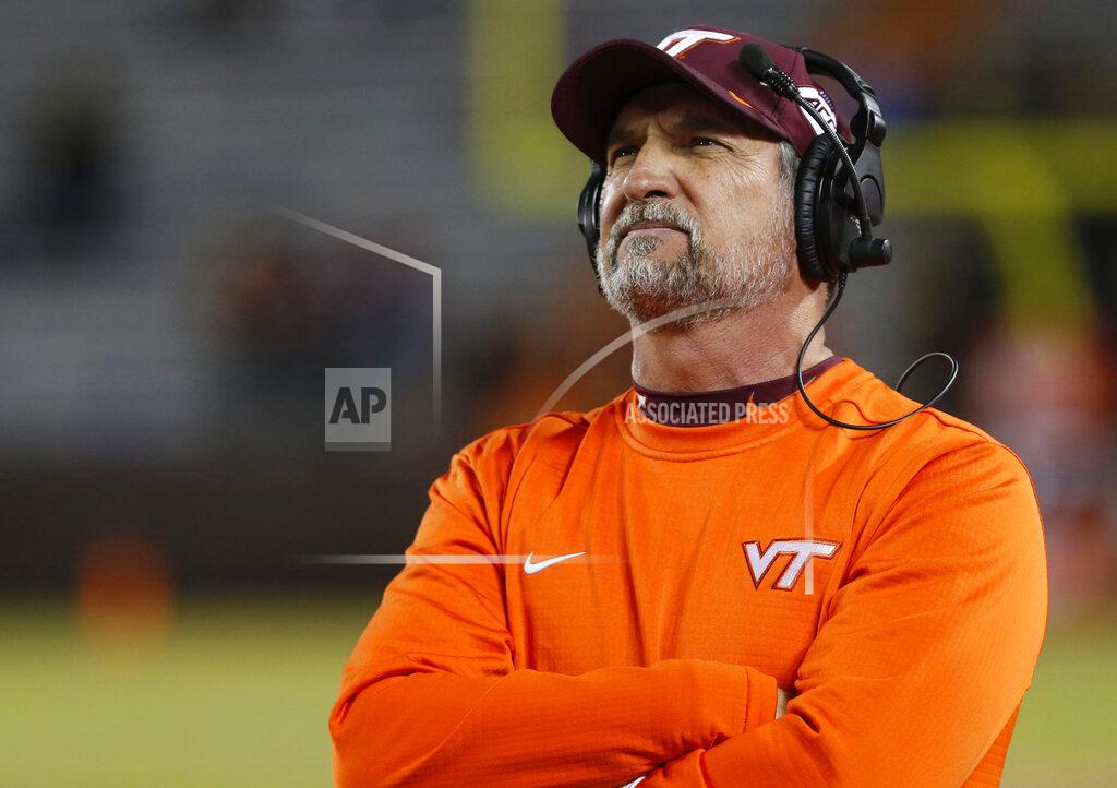 Steve Helber FILE - In this Oct. 25, 2019, file photo, Virginia Tech defensive coordinator Bud Foster looks at the scoreboard during the second half of the team's NCAA college football game against Georgia Tech in Blacksburg, Va. The Hokies are honoring Foster before the game against Wake Forest on Saturday, Nov. 9, with “Bud Foster Day.” Foster, who has kept the Virginia Tech defense among the nation’s best for many of his 33 years at the school, is retiring after this season. (AP Photo/Steve Helber, File)