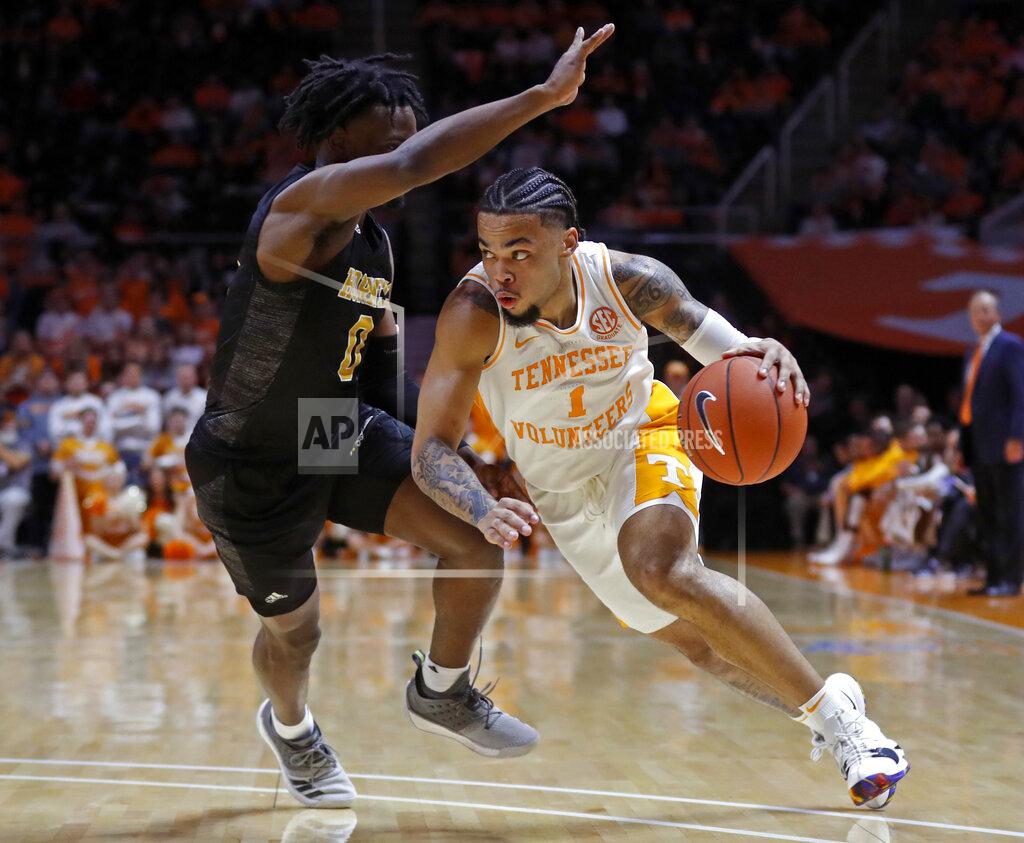 Wade Payne Tennessee guard Lamonte Turner (1) drives against Alabama State guard D.J. Heath (0) during the first half of an NCAA college basketball game Wednesday, Nov. 20, 2019, in Knoxville, Tenn. (AP Photo/Wade Payne)