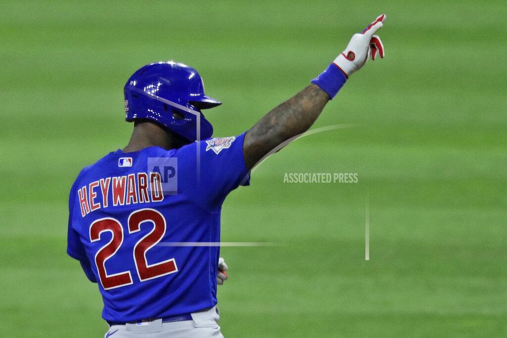 Tony Dejak Chicago Cubs' Jason Heyward points toward the dugout after hitting a one-run double in the ninth inning in a baseball game against the Cleveland Indians, Wednesday, Aug. 12, 2020, in Cleveland. (AP Photo/Tony Dejak)