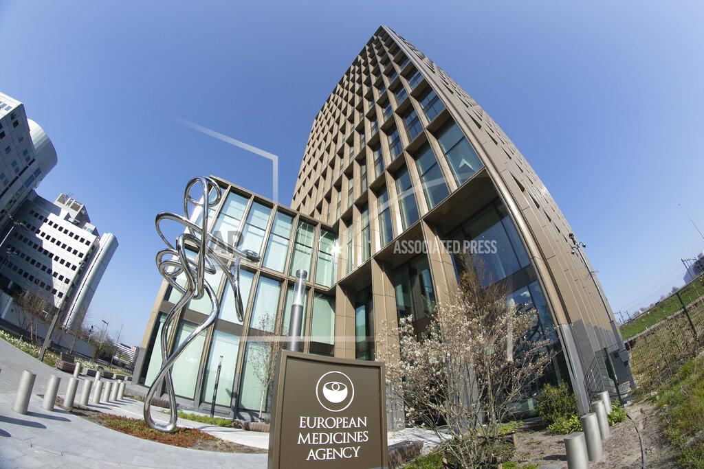 Peter Dejong FILE - Exterior view of the European Medicines Agency, EMA, in Amsterdam's business district, Netherlands, Tuesday, April 20, 2021. EMA's human medicines committee (CHMP) has recommended granting an extension of indication for the COVID-19 vaccine Comirnaty to include use in children aged 5 to 11. The vaccine, developed by BioNTech and Pfizer, is already approved for use in adults and children aged 12 and above. (AP Photo/Peter Dejong, File)