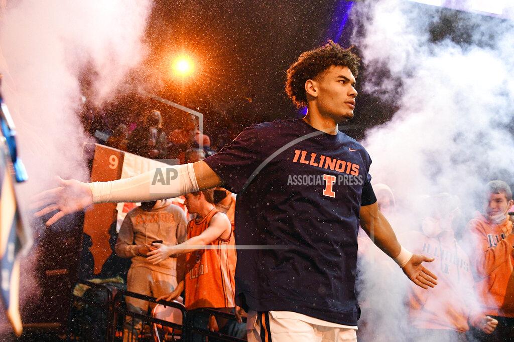 Michael Allio Illinois' Benjamin Bosmans-Verdonk (13) runs onto the court before an NCAA college basketball game against Michigan State, Tuesday, Jan. 25, 2022, in Champaign, Ill. (AP Photo/Michael Allio)
