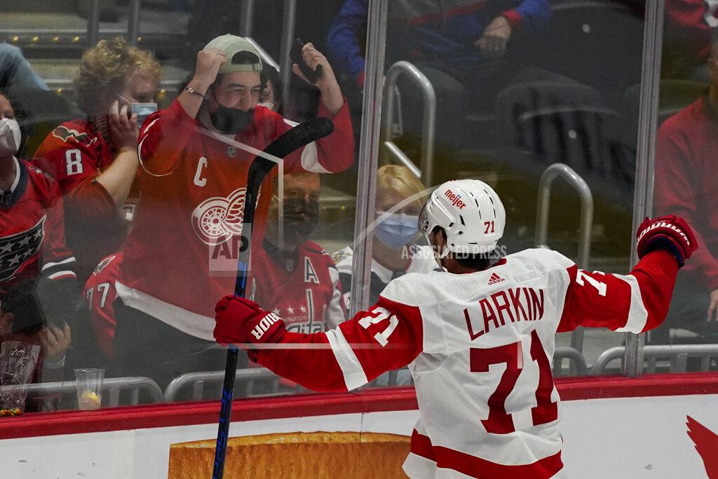 Alex Brandon Detroit Red Wings center Dylan Larkin celebrates his game-winning goal in overtime of an NHL hockey game against the Washington Capitals, Wednesday, Oct. 27, 2021, in Washington. The Red Wings won 3-2. (AP Photo/Alex Brandon)