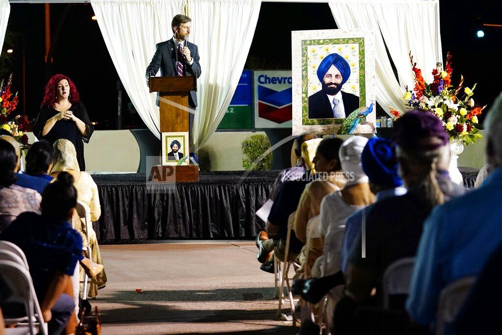 Ross D. Franklin Arizona Democratic Rep. Greg Stanton speaks at a memorial service on the 20th anniversary of the murder of Balbir Singh Sodhi Wednesday, Sept. 15, 2021, in Mesa, Ariz. Sikh businessman Balbir Singh Sodhi was helping plant a flower bed at his Arizona gas station when he was shot dead by a man seeking to avenge 9/11. Mistaken for an Arab Muslim because of his turban and beard, Sodhi was the first person to die in a wave of bias crimes unleashed by the attacks. (AP Photo/Ross D. Franklin)