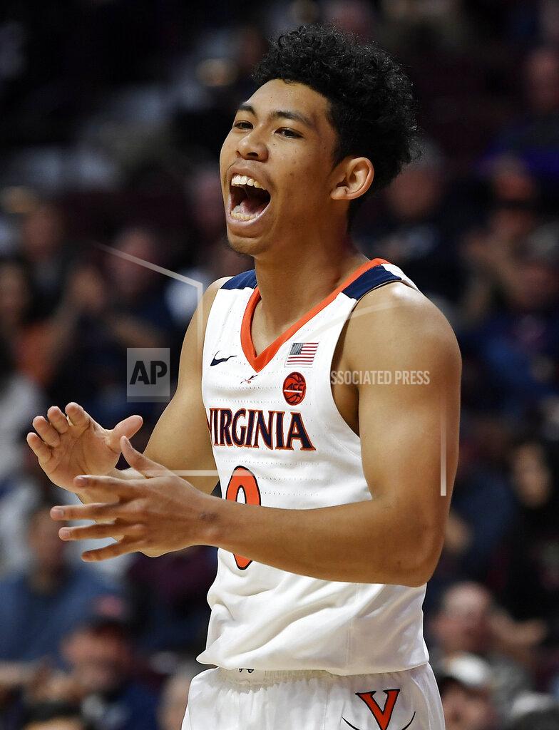 Jessica Hill Virginia's Kihei Clark reacts during the first half of an NCAA college basketball game against Arizona State, Sunday, Nov. 24, 2019, in Uncasville, Conn. (AP Photo/Jessica Hill)