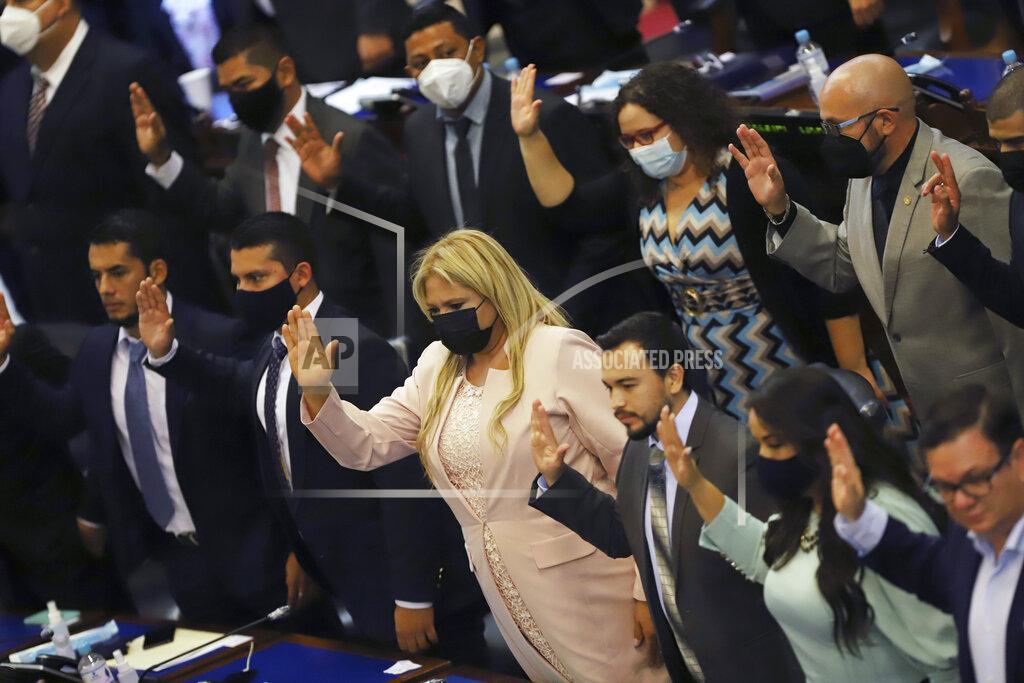 Salvador Melendez New members of the New Ideas party are sworn in during the Legislative Assembly in San Salvador, El Salvador, Saturday, May 1, 2021. (AP Photo/Salvador Melendez)