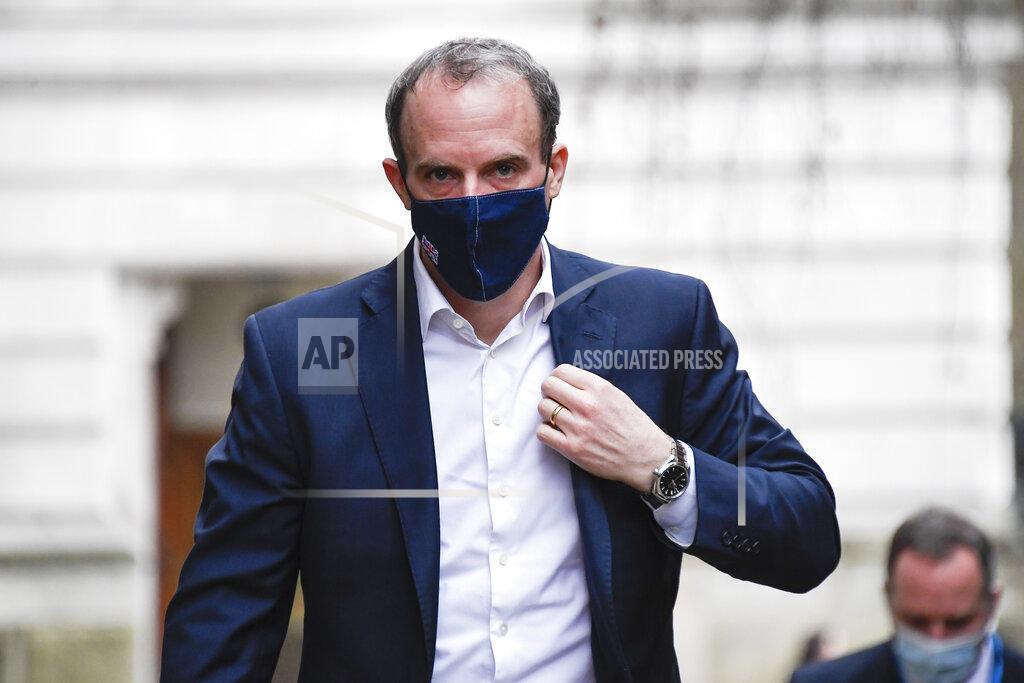 Alberto Pezzali Britain's Foreign Secretary Dominic Raab wears a face mask as he arrives at 10 Downing Street, in London, Wednesday, Feb. 3, 2021.(AP Photo/Alberto Pezzali)