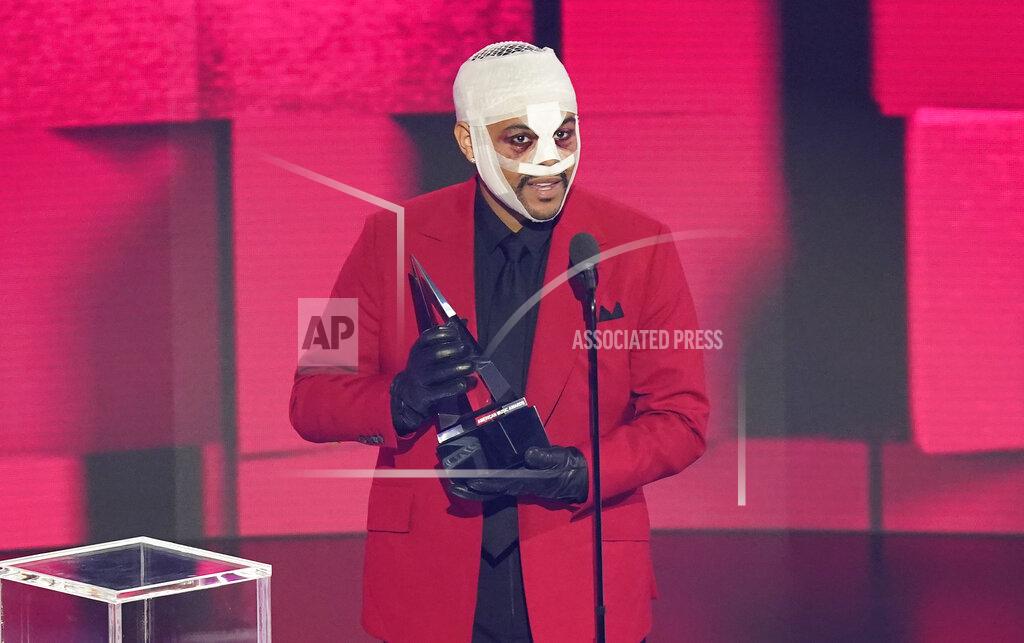 Chris Pizzello The Weeknd accepts the award for favorite male soul/R&B artist at the American Music Awards on Sunday, Nov. 22, 2020, at the Microsoft Theater in Los Angeles. (AP Photo/Chris Pizzello)