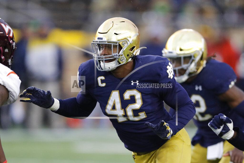 Carlos Osorio FILE - In this Nov. 2, 2019, file photo, Notre Dame defensive lineman Julian Okwara (42) in action during the second half of an NCAA college football game against Virginia Tech in South Bend, Ind. Okwara was selected by the Detroit Lions in the third round of the NFL football draft Friday, April 24, 2020. (AP Photo/Carlos Osorio, File)