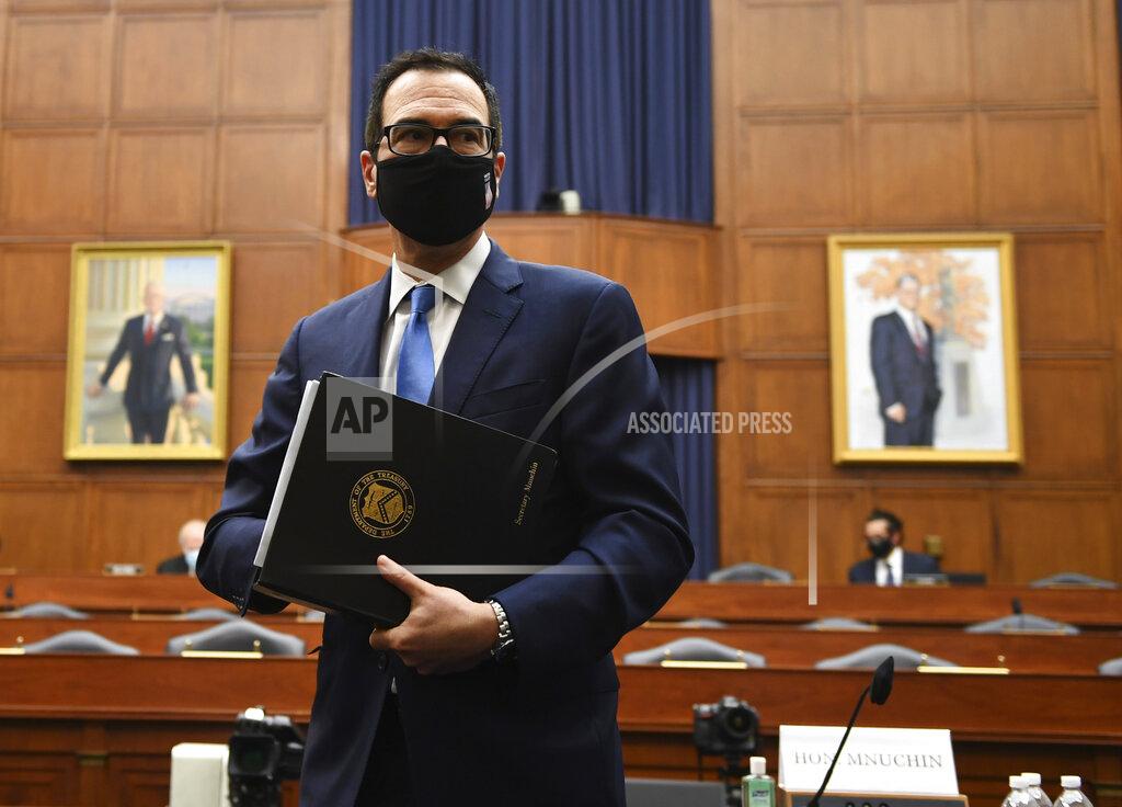 Treasury Secretary Steven Mnuchin leaves after a House Small Business Committee hearing on oversight of the Small Business Administration and Department of Treasury pandemic programs on Capitol Hill in Washington, Friday, July 17, 2020. (Kevin Dietsch/Pool via AP)