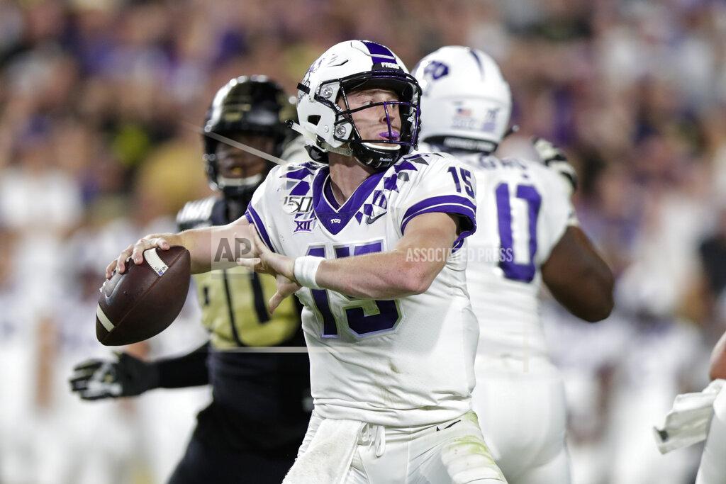Michael Conroy TCU quarterback Max Duggan (15) prepares to throw a pass against Purdue during the second half of an NCAA college football game in West Lafayette, Ind., Saturday, Sept. 14, 2019. (AP Photo/Michael Conroy)