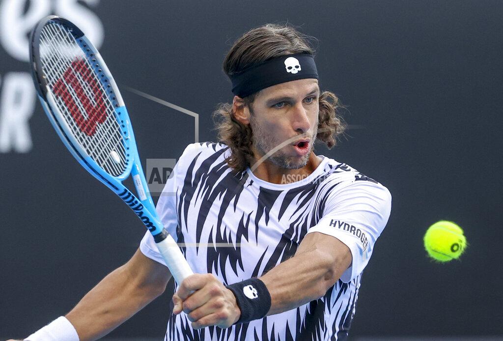 Hamish Blair Spain's Feliciano Lopez makes a backhand return to South Africa's Kevin Anderson during a tuneup tournament ahead of the Australian Open tennis championships in Melbourne, Australia, Monday, Feb. 1, 2021. (AP Photo/Hamish Blair)