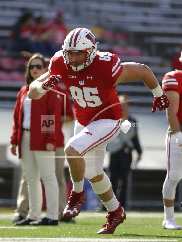 Morry Gash FILE - In this Sept. 9, 2017, file photo, Wisconsin's Zander Neuville warms up before an NCAA college football game against Florida Atlantic, in Madison, Wis. The offense is nearly back to full strength at No. 6 Wisconsin. Tight end Zander Neuville returned last week from injury. Receiver Danny Davis is due back from suspension this weekend. Two more targets for quarterback Alex Hornibrook when BYU visits Camp Randall Stadium on Saturday. . (AP Photo/Morry Gash, File)